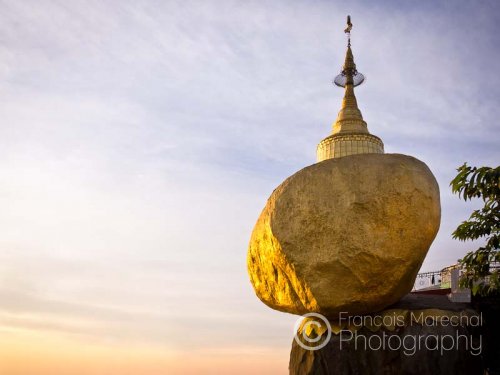 The Kyaiktiyo Pagoda is a small pagoda built on top of a granite boulder covered with gold leaves. Legend states that the boulder maintains its balance due to one of Buddha's hair in the stupa. Mount Kyaiktiyo is the third most important Buddhist pilgrimage site in Burma.