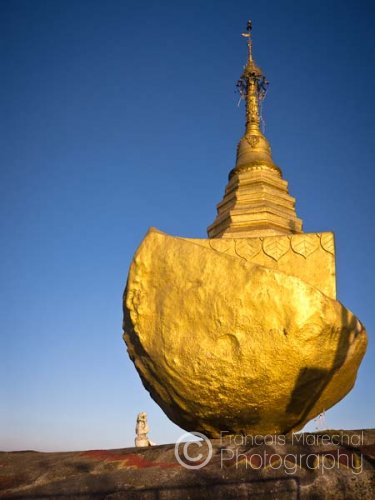 The legend says that the boat who carried the Golden Rock from the bottom of the sea to Mount Kyaiktiyo turned into a stone upon arrival. It is known as the Kyaukthanban Pagoda (literally, the stone boat stupa) and is now worshipped by pilgrims.