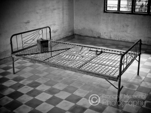 In August 1975, four months after the Khmer Rouge won the civil war, the Chao Ponhea Yat High School was turned into a prison and interrogation center. The complex was renamed "Security Prison 21" (S-21).