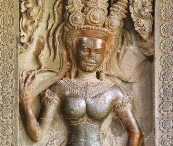 Devatas are characteristic of the Angkor Wat style of bas relief carving, and these female religious and devotional figures are said to be guardian spirits.