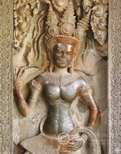 Devatas are characteristic of the Angkor Wat style of bas relief carving, and these female religious and devotional figures are said to be guardian spirits.