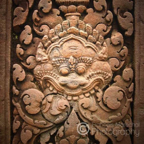 Banteay Srei is known for the intricacy of its carvings. This carving is of a kala, a mythical creature representative of time and of the god Shiva.