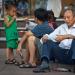 Shanghai is hot and very humid in summertime. Tourists and locals alike often look for some shade to rest. One can also sit right outside a retail shop which continuously blows cold air.