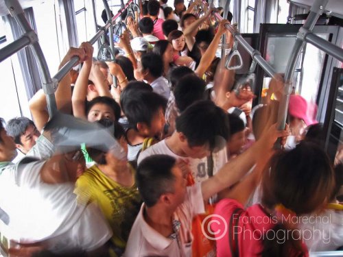 What amazes me in China is that you can always pack twice as much people in a bus as what the safety sign says.