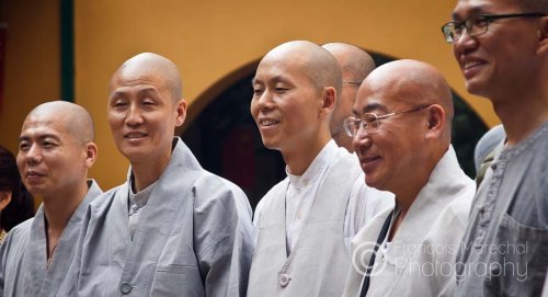 Candid shot of a group of monks visiting the Jade Buddha Temple in Shanghai.