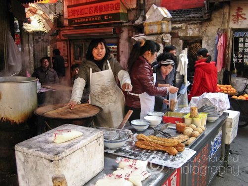 Noddle soups, fritters and other Chinese delicacies can be found in any food street market.